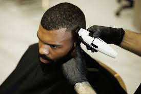 Barber giving a fresh haircut